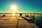 Empty wooden pier at beautiful colorful morning. Tourist wharf in sea bay.