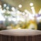 Empty wooden round table and blurred background