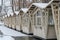 Empty wooden shopping stalls at closed christmas market. Consequences of pandemic