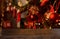 Empty wooden table on background of christmas tree , santa socks, candles Christmas background.Ready for product montage.Mockup.