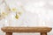 Empty wooden table on blurred abstract background of spa products
