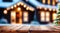 Empty wooden table, blurred Christmas decorated house exterior