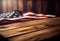 Empty wooden table with with blurred USA flag background