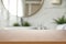 Empty wooden table and blurred view of bathroom interior