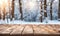 Empty wooden table, blurred winter background with copy space