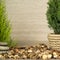 Empty wooden table decorated with organic things, stones, plants