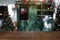 Empty wooden table in front of abstract blurred Christmas house exterior. For montage product display