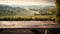 An empty wooden table for product display blurred french vineyard in the background