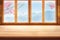 Empty Wooden table top with wood window and mountain view and sakura flower branch display for product concept