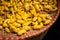 Empty yellow cocoons silkworm in a basket