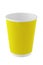 Empty yellow disposable paper cup for drinks isolated on white background. Plastic pollution reduction concept. Zero waste concept