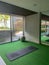 Empty yoga hall with fitness ball and exercise mat