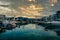 Empuriabrava spanish town in view of main water channel with boats at dusk. Landscape of the catalan town in the Costa Brava