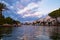 Empuriabrava spanish town in view of main water channel with boats at dusk. Landscape of the catalan town in the Costa Brava