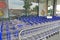 EMSTEK, GERMANY - August 01, 2020: View to row of shopping carts next to entrance of discout supermarket ALDI Nord