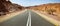 Emty asphalt road desert panorama.