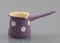 Enameled pot with handle