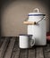 Enameled tin mug and kitchen storage canister