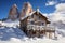 Enchanting Alpine Villages with Traditional Houses Against Majestic Mountain Peaks