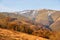 Enchanting Autumn Splendor: Majestic Carpathian Peaks Amidst a Colorful Tapestry