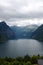 Enchanting beauty of Geirangerfjord, stunning fjord in Norway. Fjord is surrounded by majestic mountains, covered with