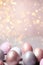 Enchanting Easter background with eggs, bokeh lights and copy space for text. Soft, pastel colors. Tranquil and joyful