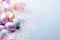 Enchanting Easter background with eggs, feathers, glitter and copy space for text. Soft, pastel colors. Tranquil and