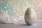 Enchanting Easter Egg Bedazzled with Glitter and Sparkles Against a Backdrop of Bokeh Lights and White Feathers. Copy