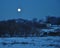 An enchanting night landscape with full moon in the early spring outdoors