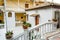 Enchanting Traditional Chapel in Parga Town Alley, Greece. Historic Neighborhood with Small Church, Garden, Bellfry and Houses