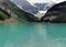 Enchanting Turquoise Colours Of Lake Louise With Snowy Mountains In The Back Banff National Park