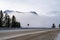 Encroaching fog along Canada Highway 93 Banff-Windermere Highway, in the Canadian Rockies Kootenay National Park during winter.