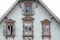 End gable and windows of an old abandoned house