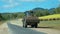 An End Loader Travelling On A Country Road