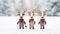 an endearing scene with three charming reindeer figurines, each wearing festive accessories