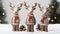 an endearing scene with three charming reindeer figurines, each wearing festive accessories