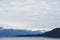 Endicott Arm, Alaska, USA: Snow-capped mountains under a cloudy sky in the Endicott Arm