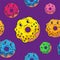 Endless background with stylized smiling glazed donuts