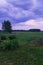 Endless expanses of fields and gray thunderclouds