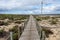 Endless long wooden boardwalk in the Ria Formosa National Park on the Algarve