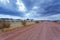 Endless road in Namibia moonscape landscape