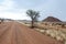 Endless road in Namibia moonscape landscape