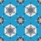 Endless winter pattern of geometric snowflakes of gray and white on blue background