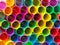 Ends of multicoloured plastic drinking straws