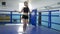 Endurance of body, sports female does skipping exercises on ring in gym