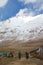 Endurance - cyclist at the start of climbing the Khardung La pass