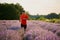 Endurance runner in a lavender plantation, jogging