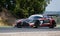 Endurance touring championship. Spectacular side view of Mercedes AMG in action during