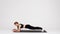 Endurance Workout. Sporty Young Woman Doing Plank Exercise On Mat In Studio