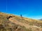 Enduro ride with steep bend, banked curve, Swiss Mountain Alps at Davos Switzerland. With blue clear sky and great view